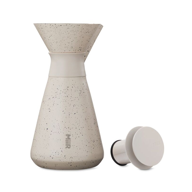 new-standard-carafe-p8 WebPDP-33oz_New_Standard_Carafe_Desert_Tan_Speckle_Studio__CAR1SVOS224_Front_Lid_Staged.jpg